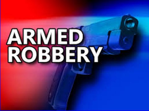 ARMED ROBBER HOLDS UP MEN AS THEY CLOSE STORE
