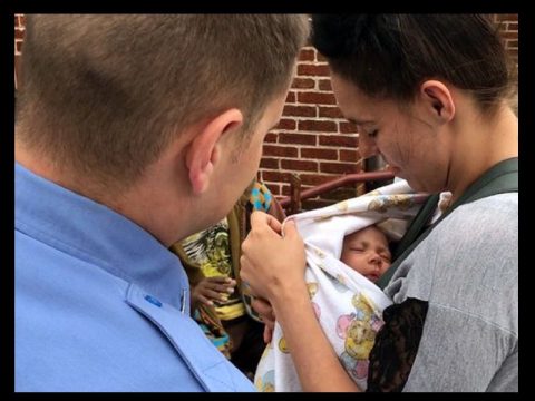 KNOXVILLE FIREFIGHTER CATCHES INFANT THROWN FROM BURNING BUILDING