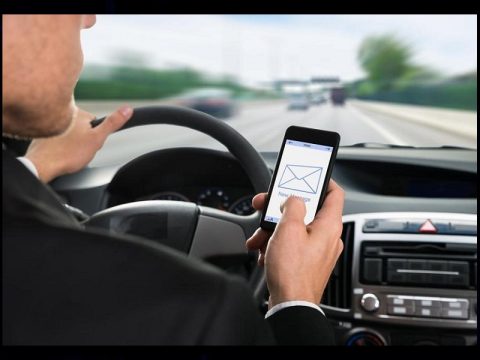 ban on hand-held cellphones while driving