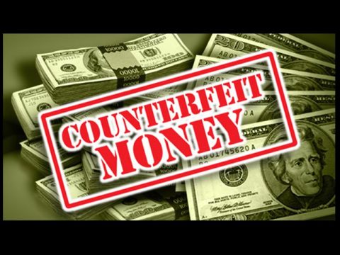 HOLIDAY SPENDING BRINGS MIXED COUNTERFEIT CASH