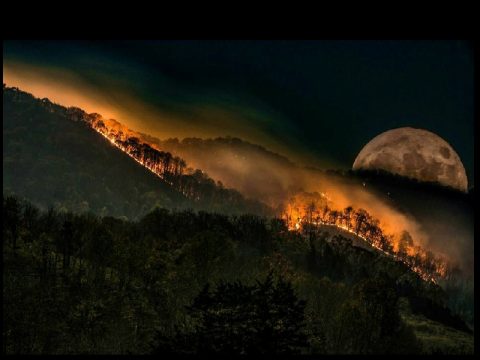 FIRE PICTURE WITH MOON IN BACKGROUND CAPTURED BY TENNESSEE HIGHWAY PATROL